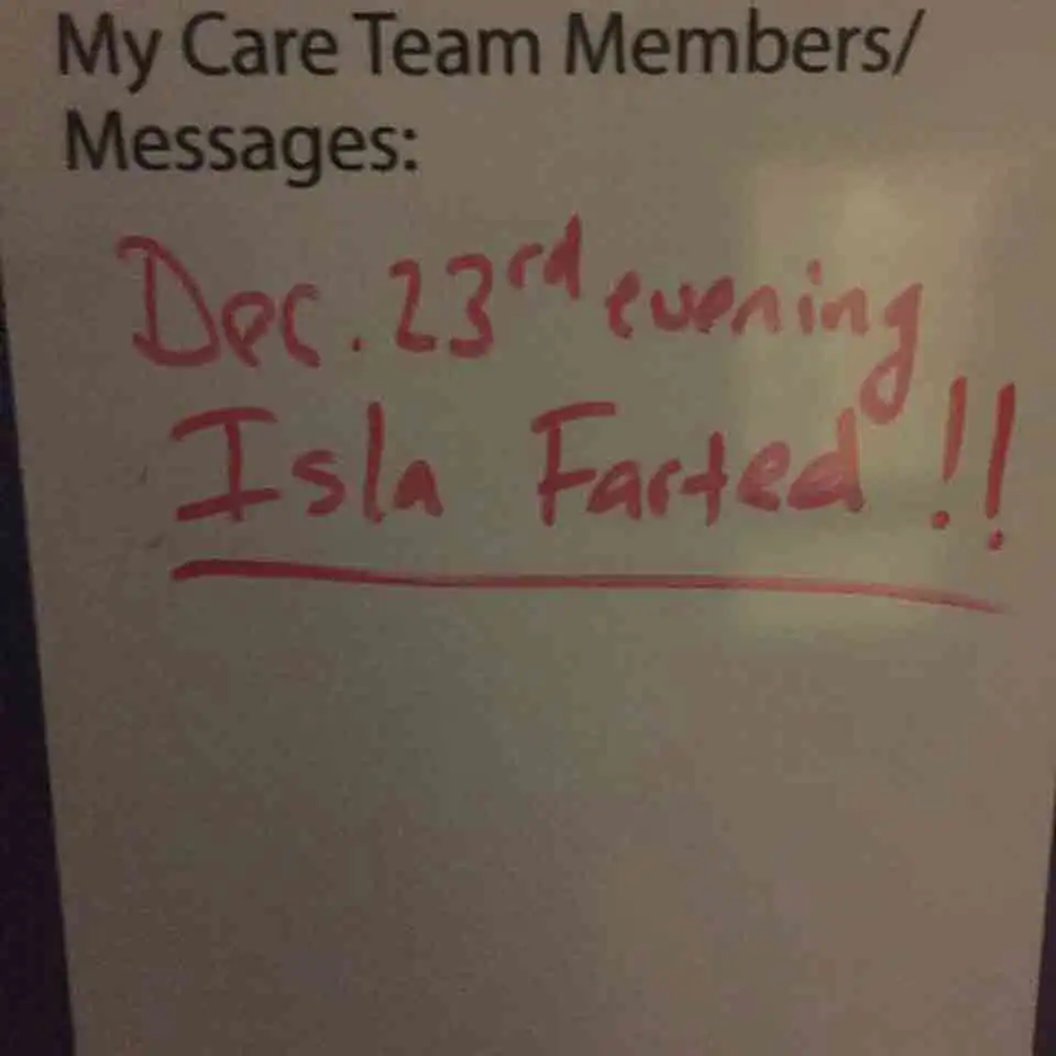 Isla's first fart post surgery signed to the white board